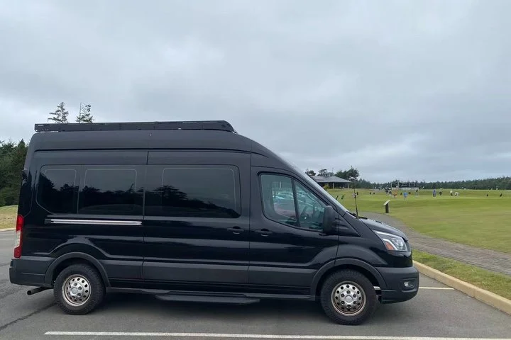 Side view of the Ford Transit high-roof van